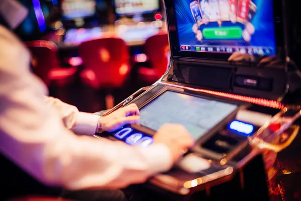 A young woman relaxing with her phone while dynamic casino elements float around her, illustrating the smooth mobile experience offered by the 778G0 app.